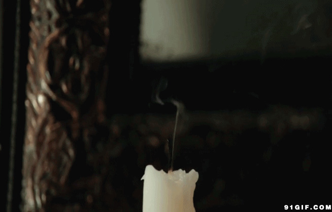 手捏蜡烛火焰视频图片