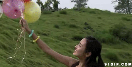 快乐女孩手中的五彩气球图片:气球,颜色