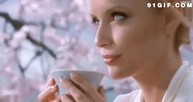 樱花下品茶欧美女子图片:樱花,喝茶