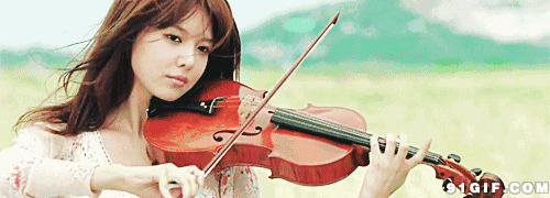 拉小提琴的文艺才女图片