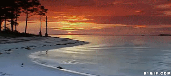 夕阳下平静的海面唯美图片:风景