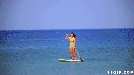 海上快乐滑板冲浪人图片