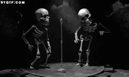 两个骷髅唱歌跳舞图片