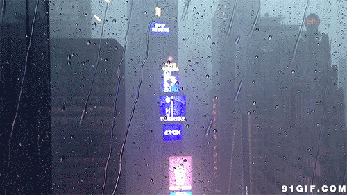 下雨的窗外高楼霓虹灯图片:下雨,灯光,玻璃