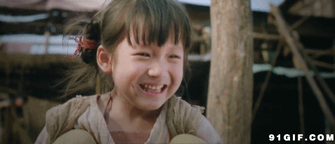 又哭又笑的小女孩图片:小女孩