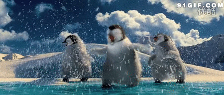 卡通企鹅雪中起舞图片