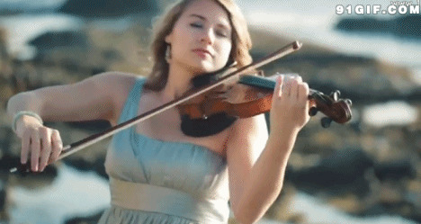 美女表情投入拉小提琴图片:美女