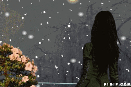 女孩眺望雪中远景唯美图片