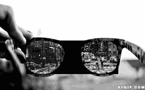 镜框里的繁忙都市图片:眼镜,城市