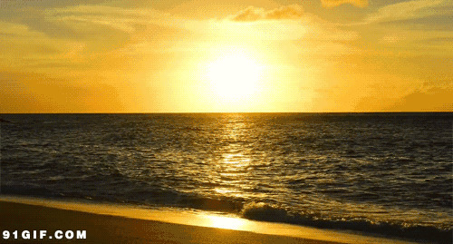 海滩黄昏的日照景色图片