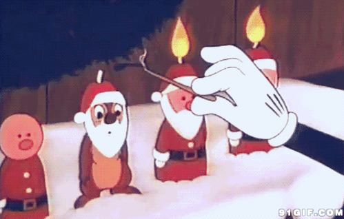 圣诞老人吹蜡烛图片