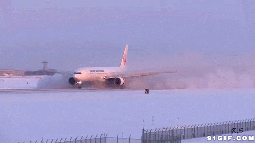 飞机机场雪地降落图片