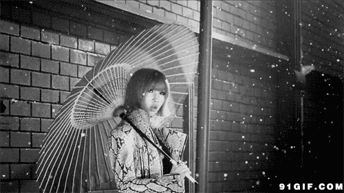 落雪中撑伞动态图:下雪,撑伞