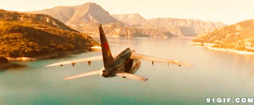 飞机飞越江河高山图片