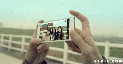 女生手机拍照动态图片:拍照,手机