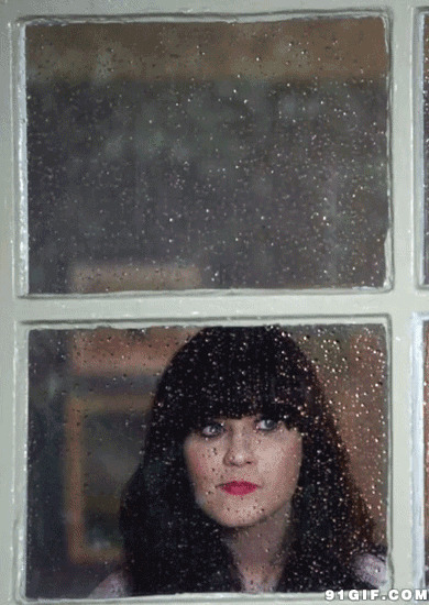 窗户里看雨的女人图片