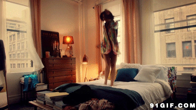 女人在床上跳舞gif图片