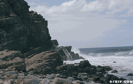 海浪冲刷岩石gif图片:海浪