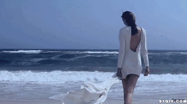 裙摆随着海风吹动图片