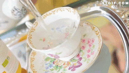 倒水花纹陶瓷杯动态图