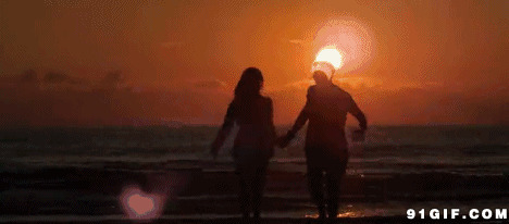海边情侣夕阳图片