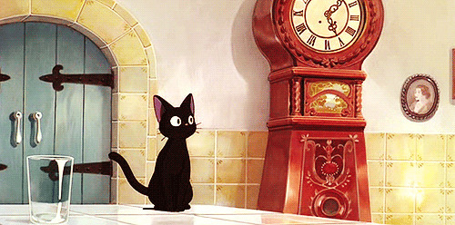 黑猫看钟动画图片:猫猫