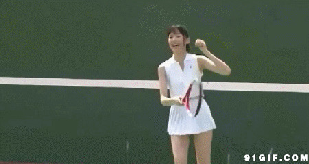 娇柔少女打网球动态图:网球