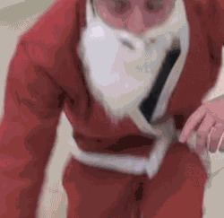 圣诞老人下滑梯搞笑图片:圣诞老人