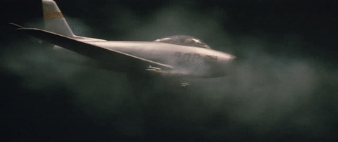 战斗机空中发射子弹动态图片:战斗机