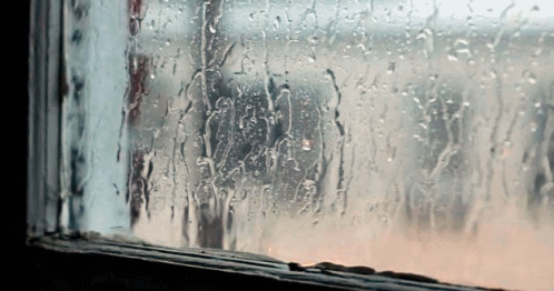打在玻璃窗上的雨gif图:下雨