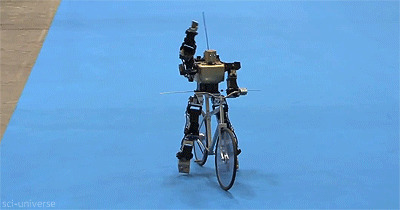 机器人骑自行车动态图片:机器人