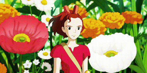 站在花丛的女孩动画图片:花园