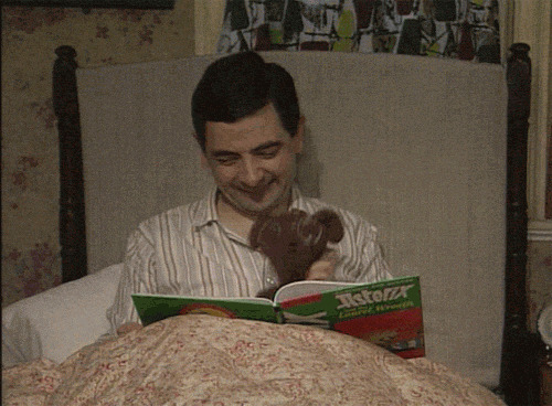 憨豆先生和小熊看书闪图