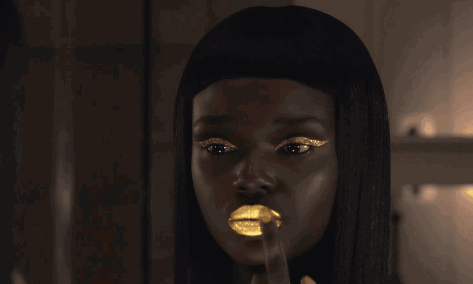 非洲女人化妆金色嘴唇动态图片:化妆