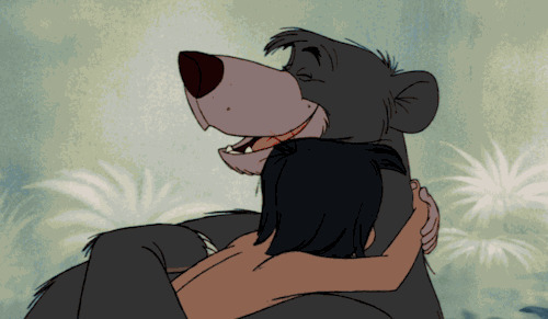 卡通小孩拥抱黑熊动态图片:黑熊