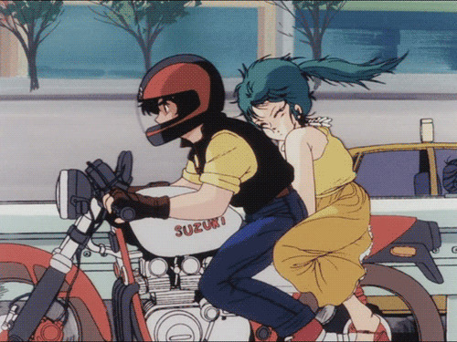 卡通男孩骑摩托兜风GIF图片:骑摩托