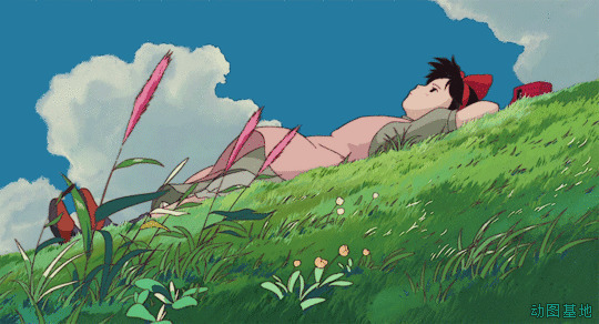 卡通小孩躺在草地上吹风gif图片