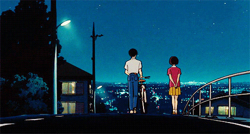 一对卡通情侣推着自行车在大街上谈情说爱gif图片