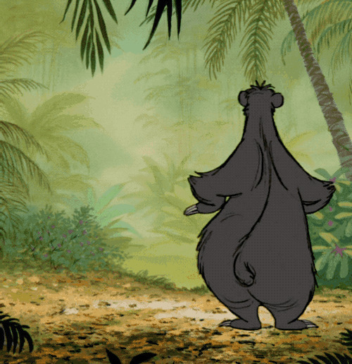 卡通大灰熊在树林里愉快的跳舞gif图片:跳舞
