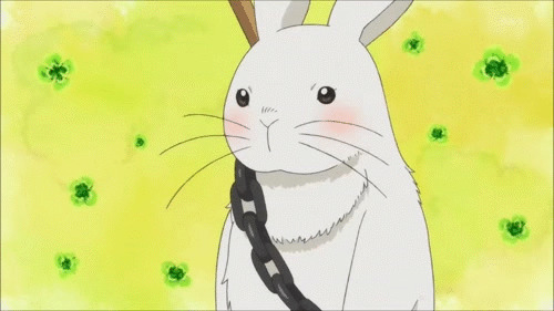 一只可爱的卡通小白兔被铁链子拴着gif图片