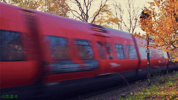 红色列车通过风情小镇动态图片:列车,高铁