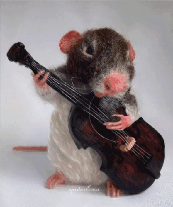 一只可爱的小老鼠弹吉他gif图片