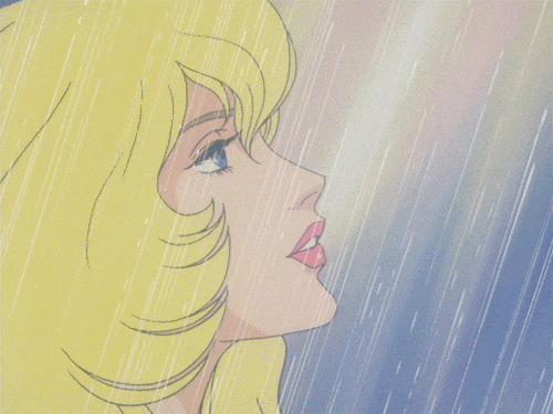 卡通长发女孩在大雨中抚摸自己的秀发样子很美GIF图片