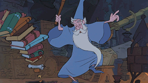 卡通长胡子老头变魔术把书本藏起来GIF图片:变魔术