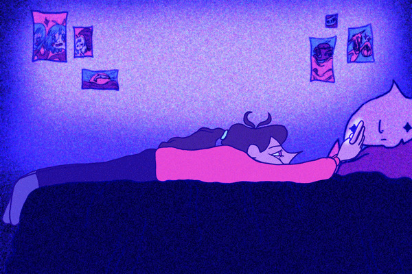 卡通小女孩趴在床上玩手机聊天GIF图片