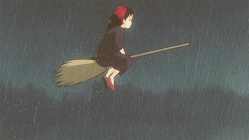 卡通女孩坐在扫把上在大雨中穿行GIF图片