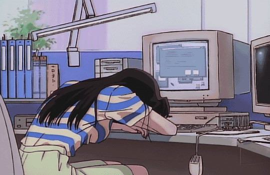 劳累的卡通女孩上班期间趴在桌子上睡觉GIF图片